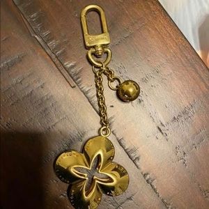 Authentic Louis Vuitton bag charm, heavy